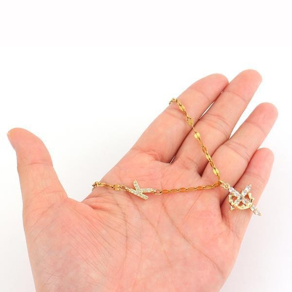 Geometric Zircon-Inlaid Cross Necklace Design