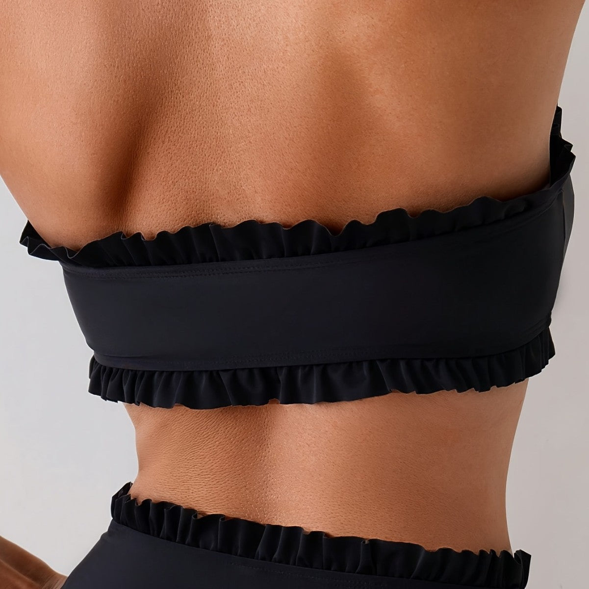 Solid-color Midriff-baring Top With Ruffled Hem And A Slim Fit
